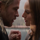 Thor and Jane Foster lean towards each other in an intimate moment.